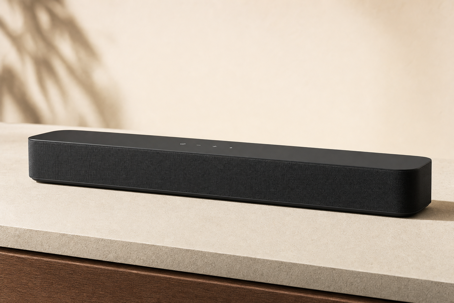 Front three-quarter view of the Amazon Fire TV Soundbar Plus on a neutral background.