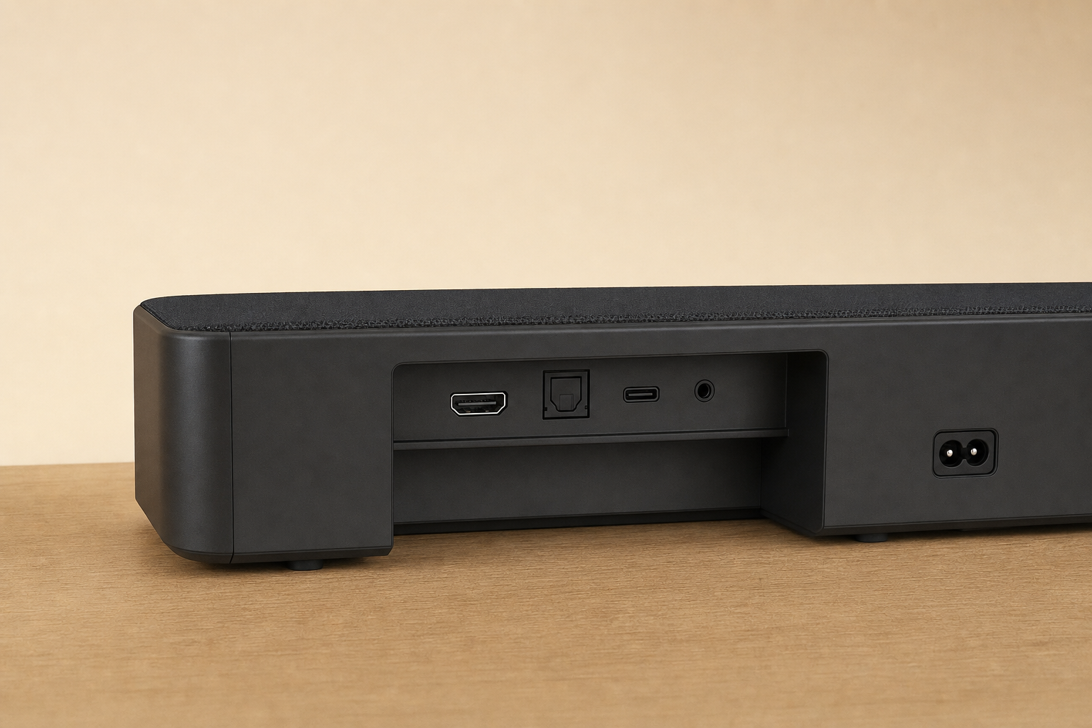 Rear connection area of a compact TV soundbar.