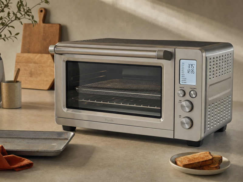 Breville Smart Oven Air Fryer Pro shown as a large multifunction countertop oven on a kitchen counter